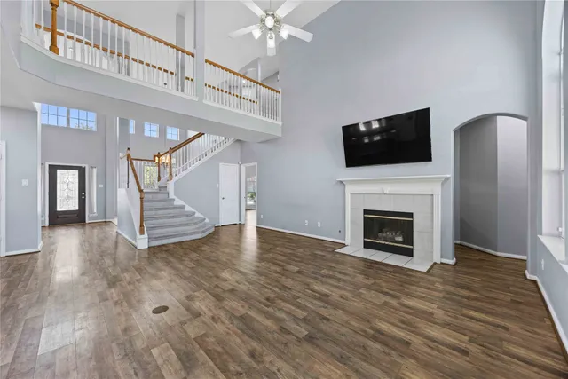 a view of livingroom with wooden floor and fireplace