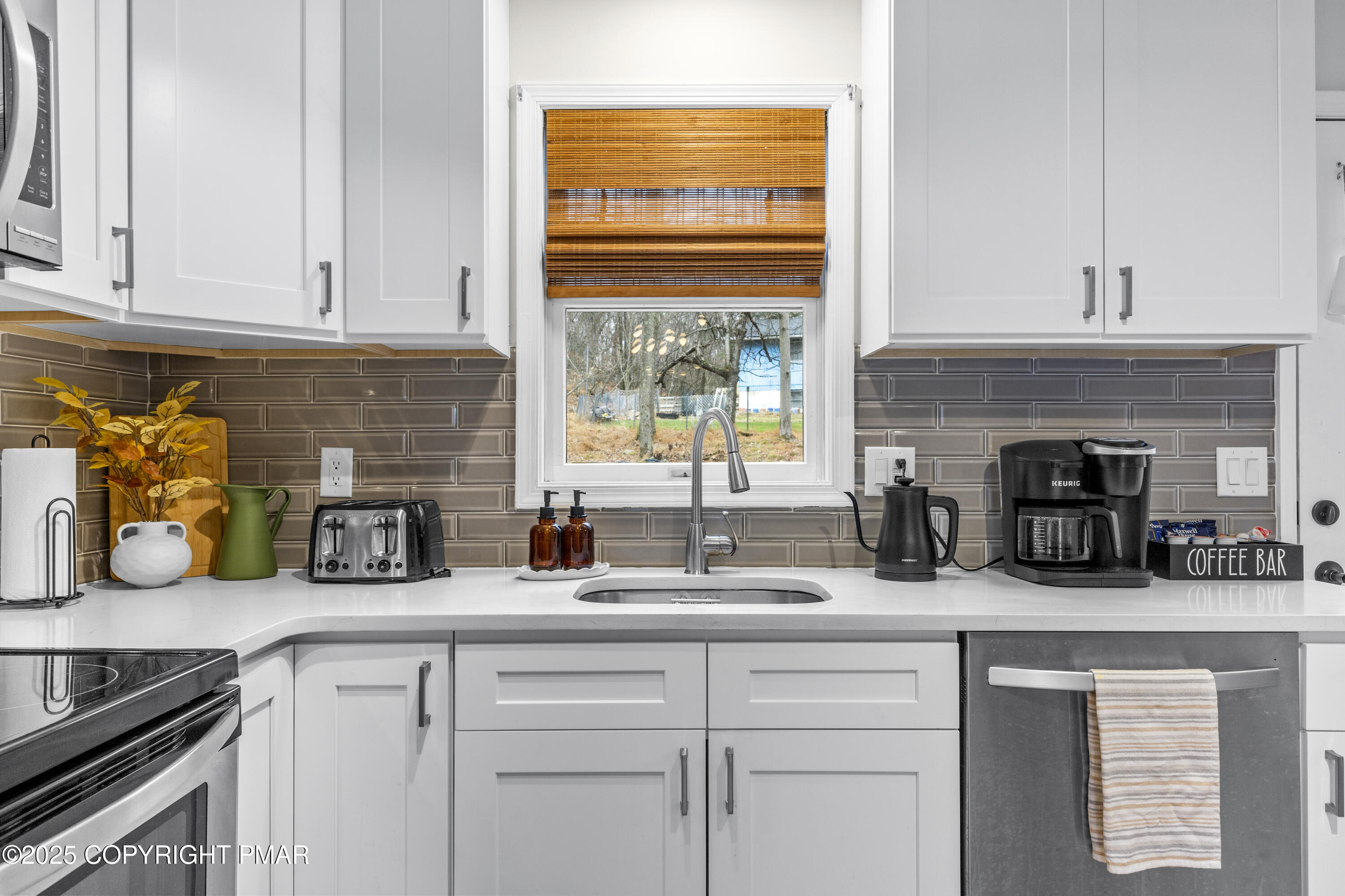 558 Clearview Drive Long Pond, PA 18334 - Photo 2 of 36 a kitchen with appliances cabinets and a window