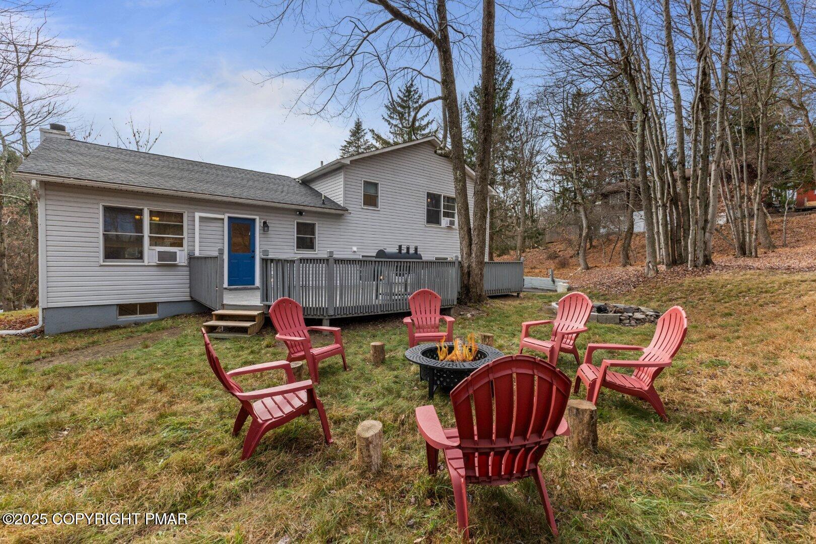 558 Clearview Drive Long Pond, PA 18334 - Photo 36 of 36 a backyard of a house with outdoor seating