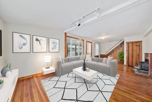 a kitchen with stainless steel appliances granite countertop a sink and a refrigerator