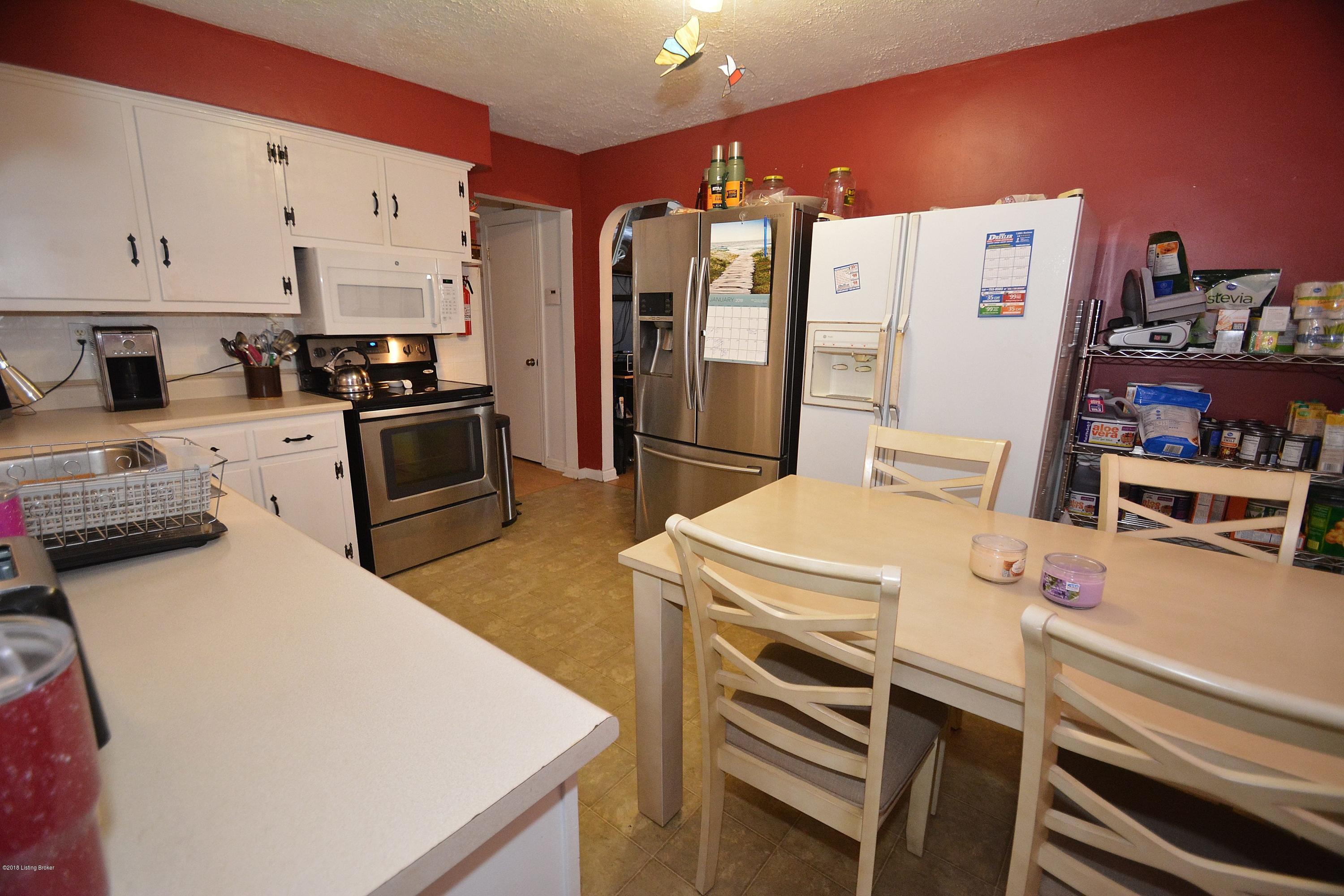 4603 Dohn Road Louisville, KY 40216 - Photo 7 of 19 7 Kitchen new microwave good floor space