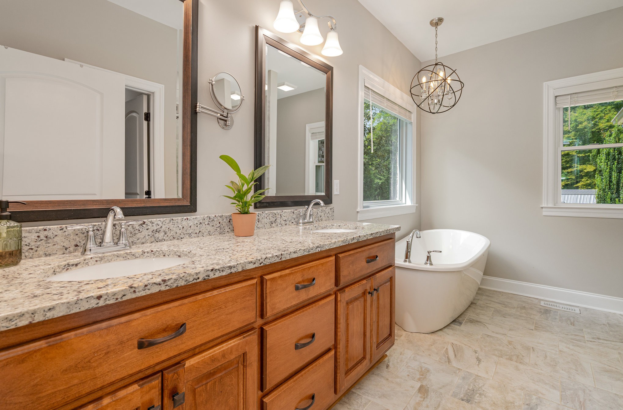 3395 Shouse Road Santa Fe, TN 38482 - Photo 14 of 73 a bathroom with a granite countertop sink mirror and bathtub