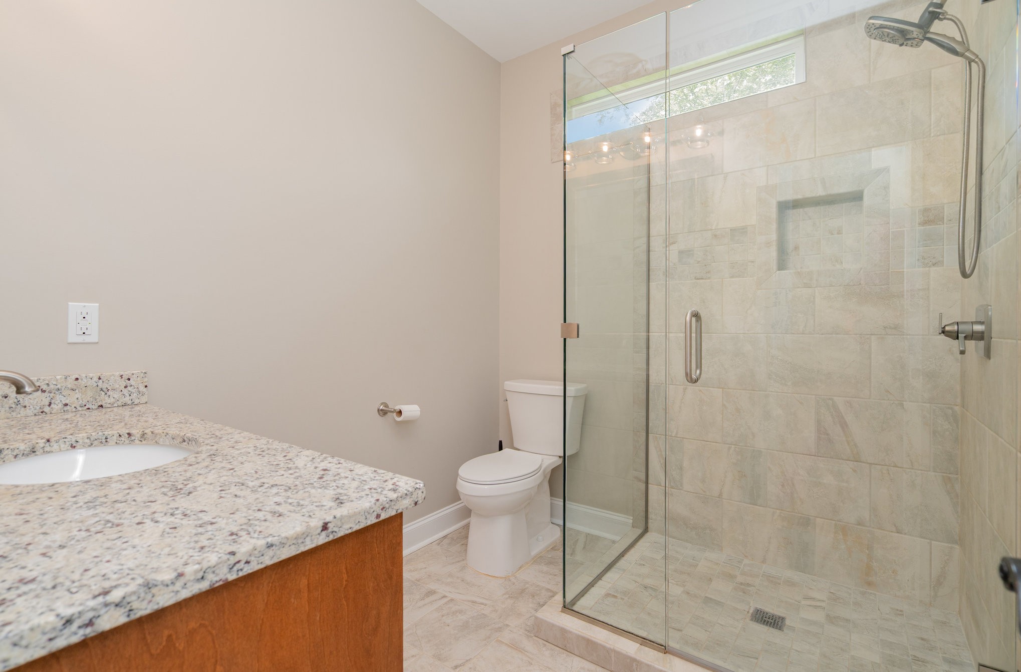 3395 Shouse Road Santa Fe, TN 38482 - Photo 18 of 73 a bathroom with a granite countertop sink a toilet and shower
