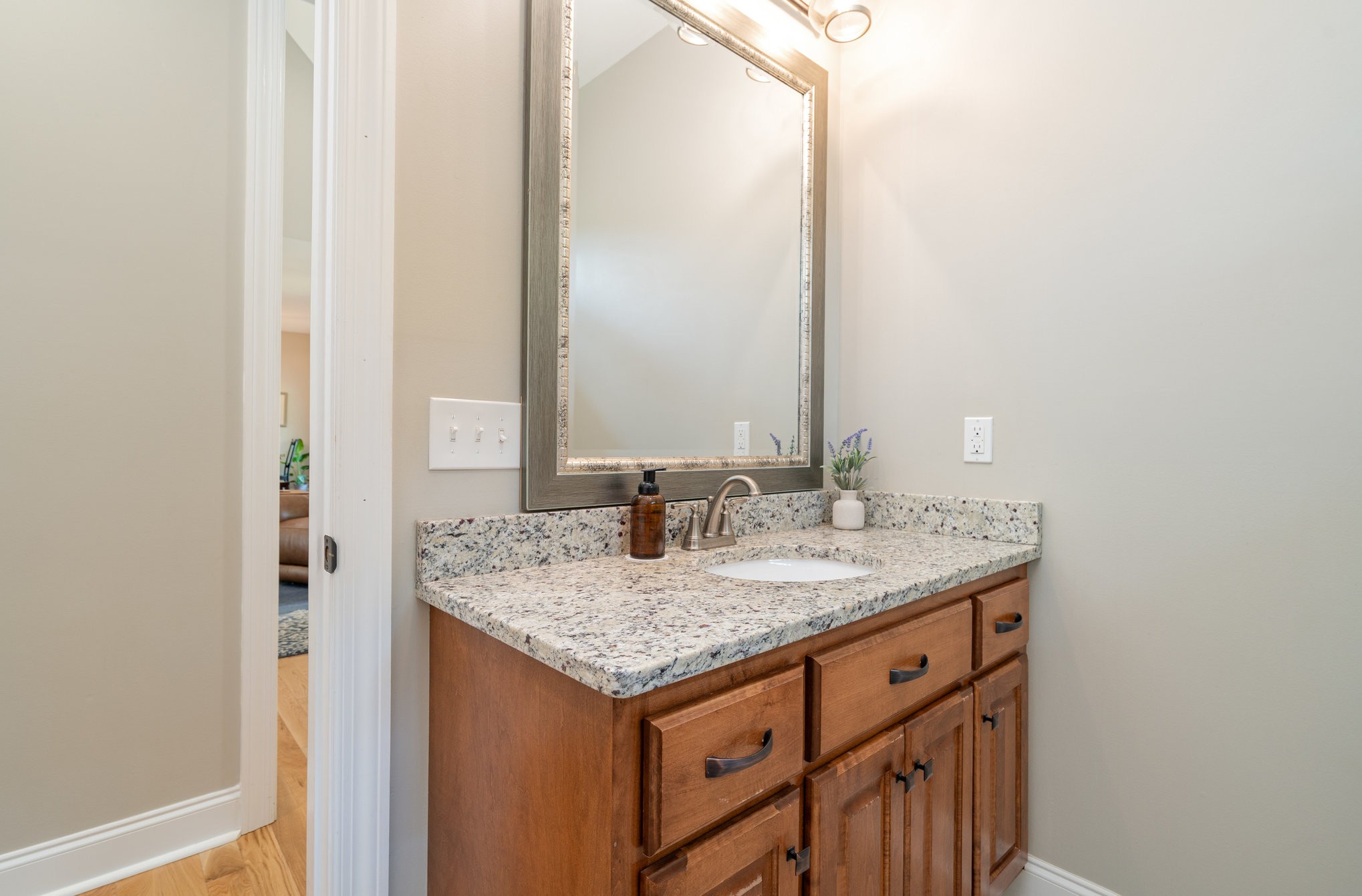 3395 Shouse Road Santa Fe, TN 38482 - Photo 19 of 73 a bathroom with a granite countertop sink and a mirror