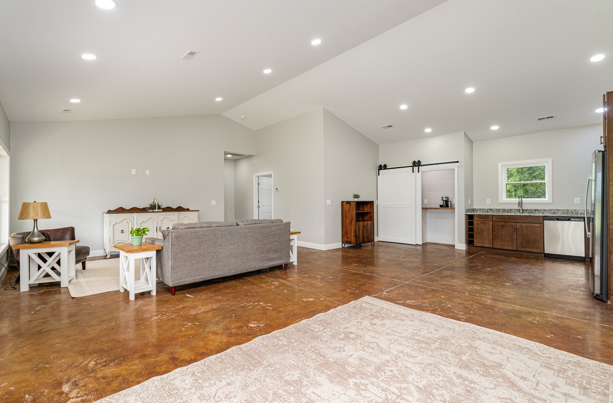 3395 Shouse Road Santa Fe, TN 38482 - Photo 39 of 73 a living room with furniture and a kitchen view with wooden floor