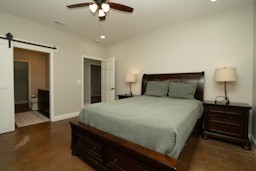 3395 Shouse Road Santa Fe, TN 38482 - Photo 40 of 73 a bedroom with a bed and a chandelier