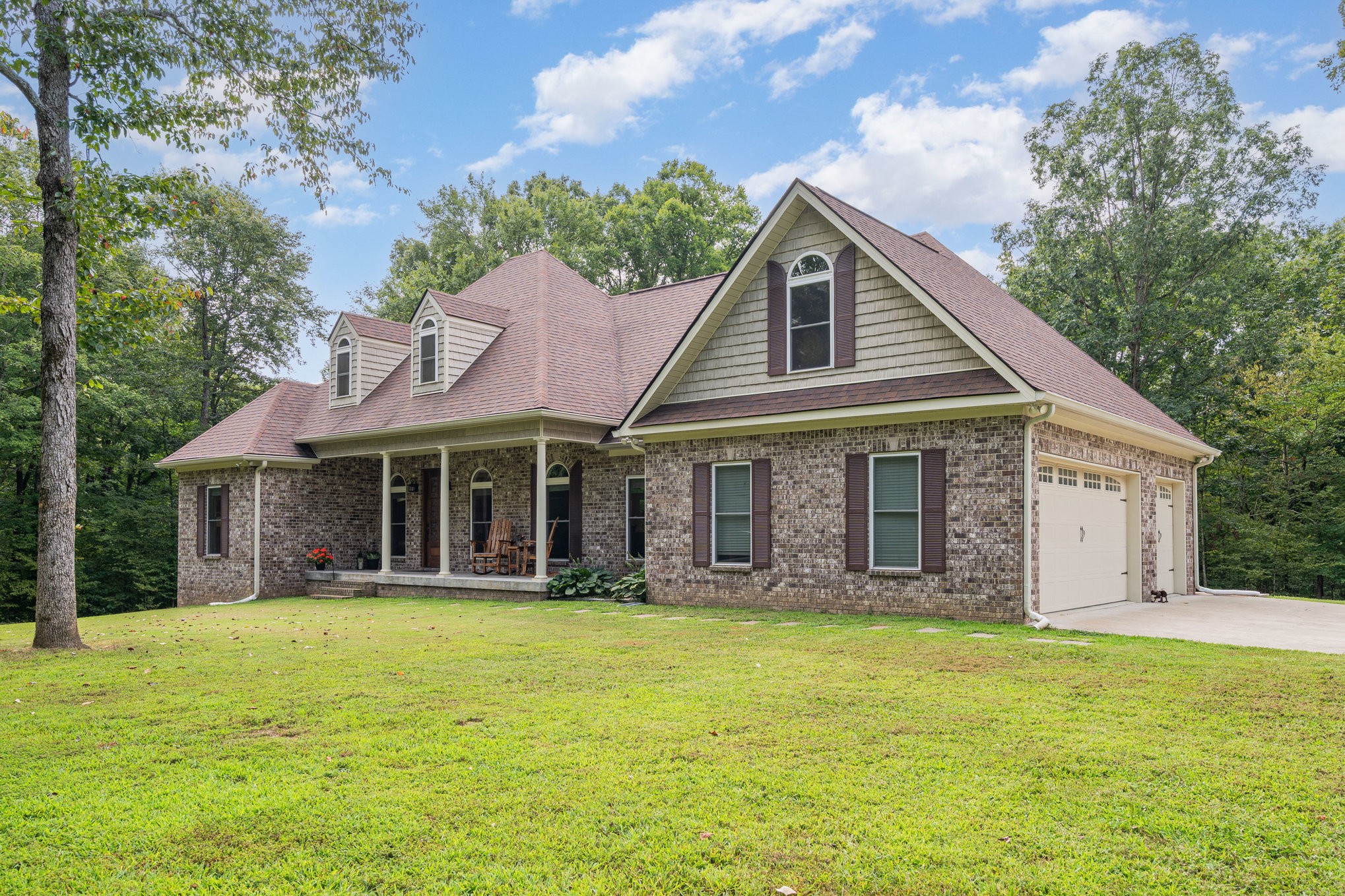 3395 Shouse Road Santa Fe, TN 38482 - Photo 4 of 73 a front view of a house with a yard