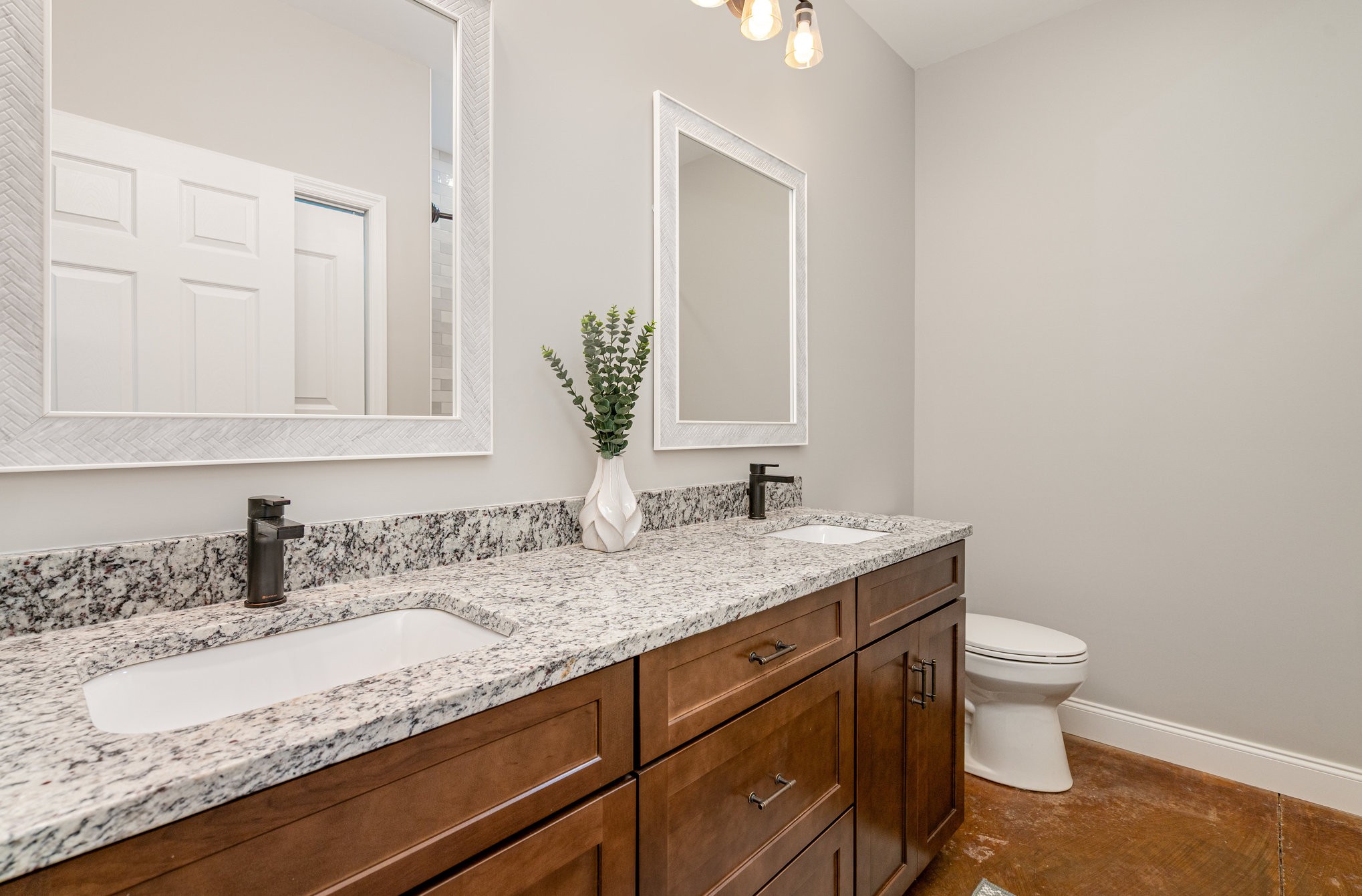 3395 Shouse Road Santa Fe, TN 38482 - Photo 45 of 73 a bathroom with a granite countertop sink a toilet and a mirror