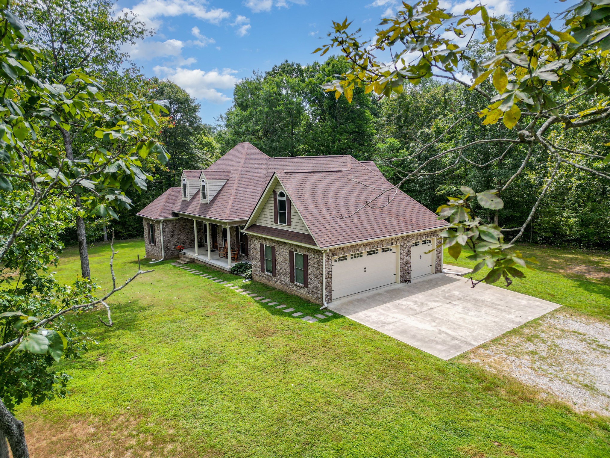 3395 Shouse Road Santa Fe, TN 38482 - Photo 56 of 73 a aerial view of a house with swimming pool next to a big yard