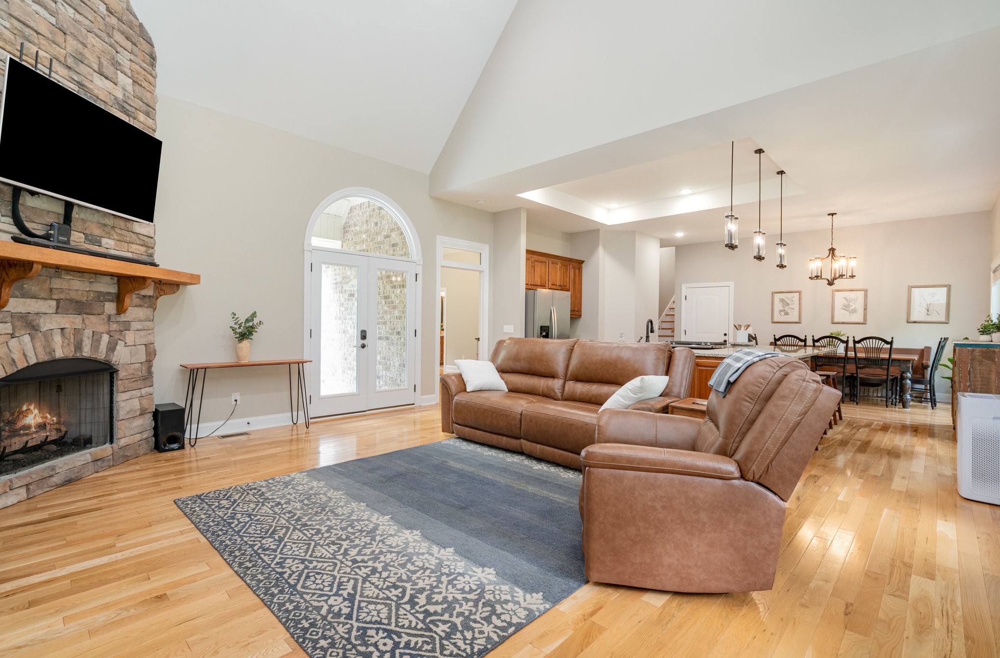 3395 Shouse Road Santa Fe, TN 38482 - Photo 7 of 73 a living room with furniture a fireplace and a flat screen tv
