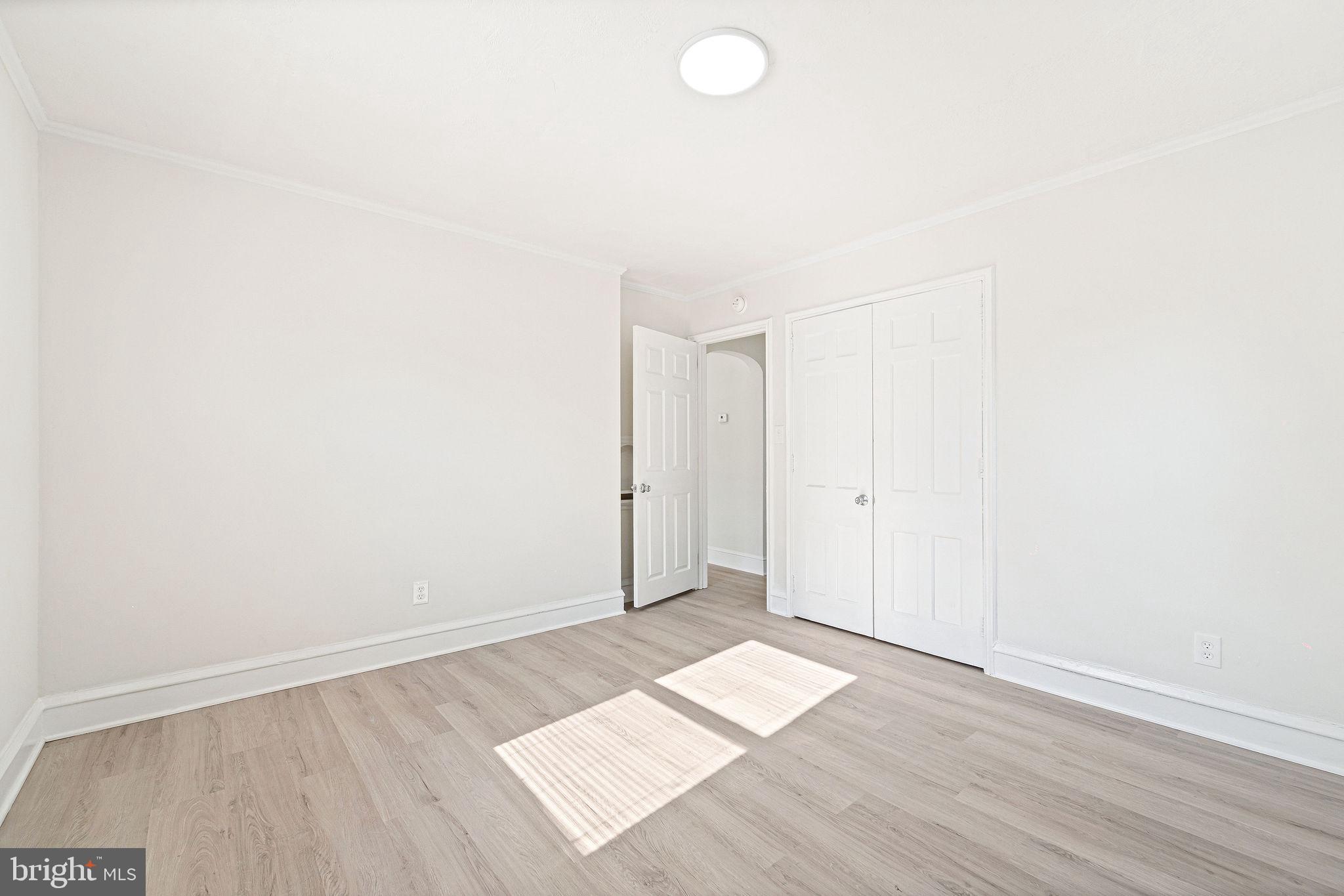 115 Chestnut Street Salem, NJ 08079 - Photo 20 of 34 an empty room with wooden floor