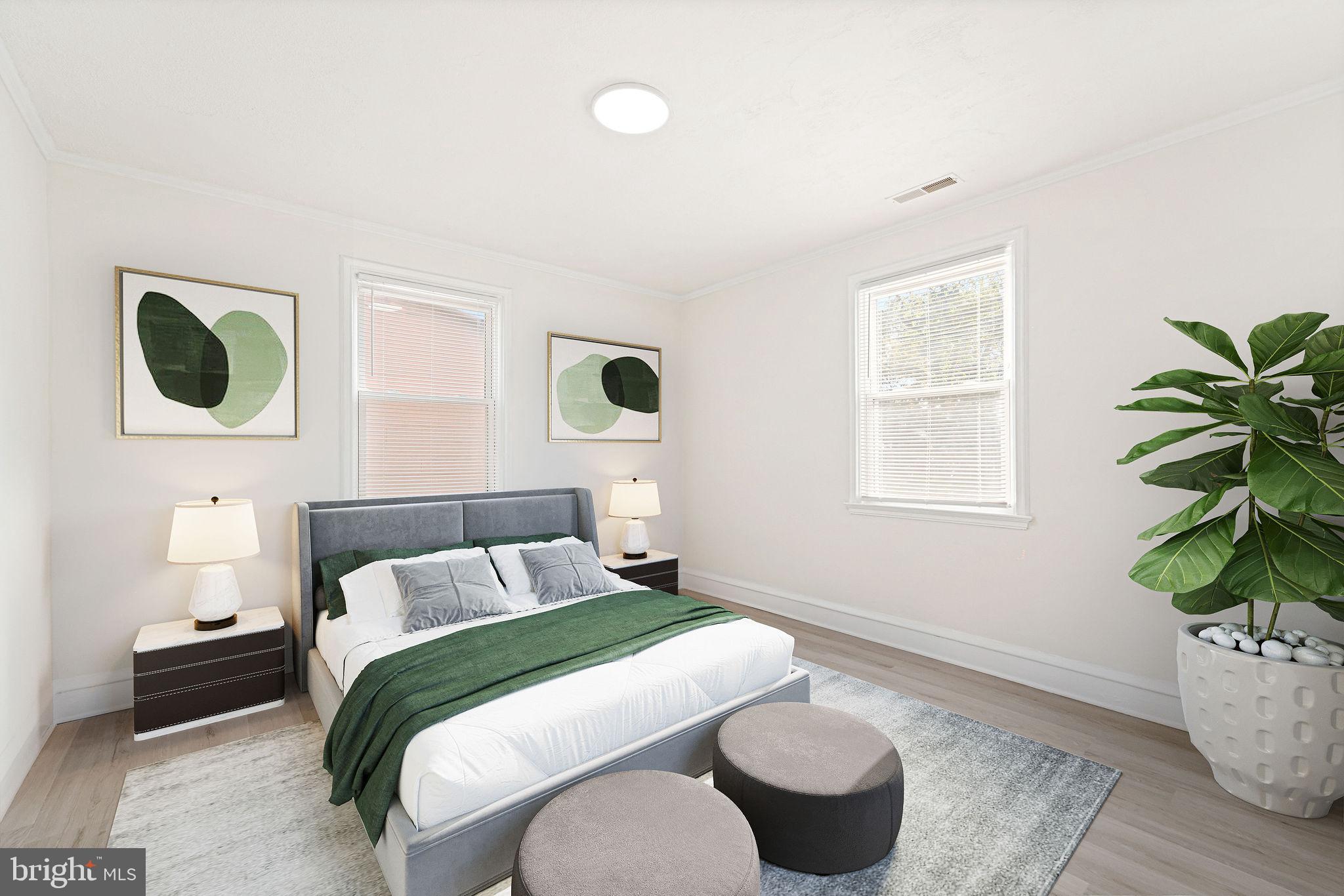 115 Chestnut Street Salem, NJ 08079 - Photo 21 of 34 a bedroom with a bed and a window
