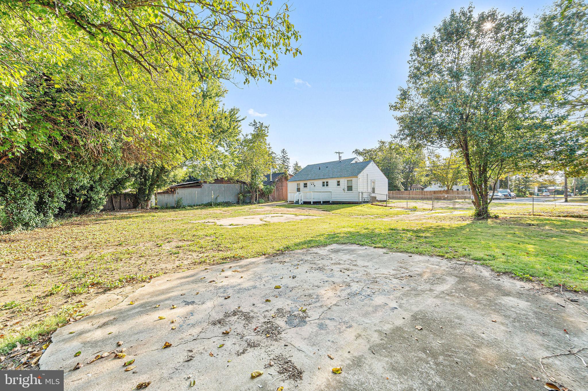 115 Chestnut Street Salem, NJ 08079 - Photo 30 of 34 a view of a swimming pool with a yard