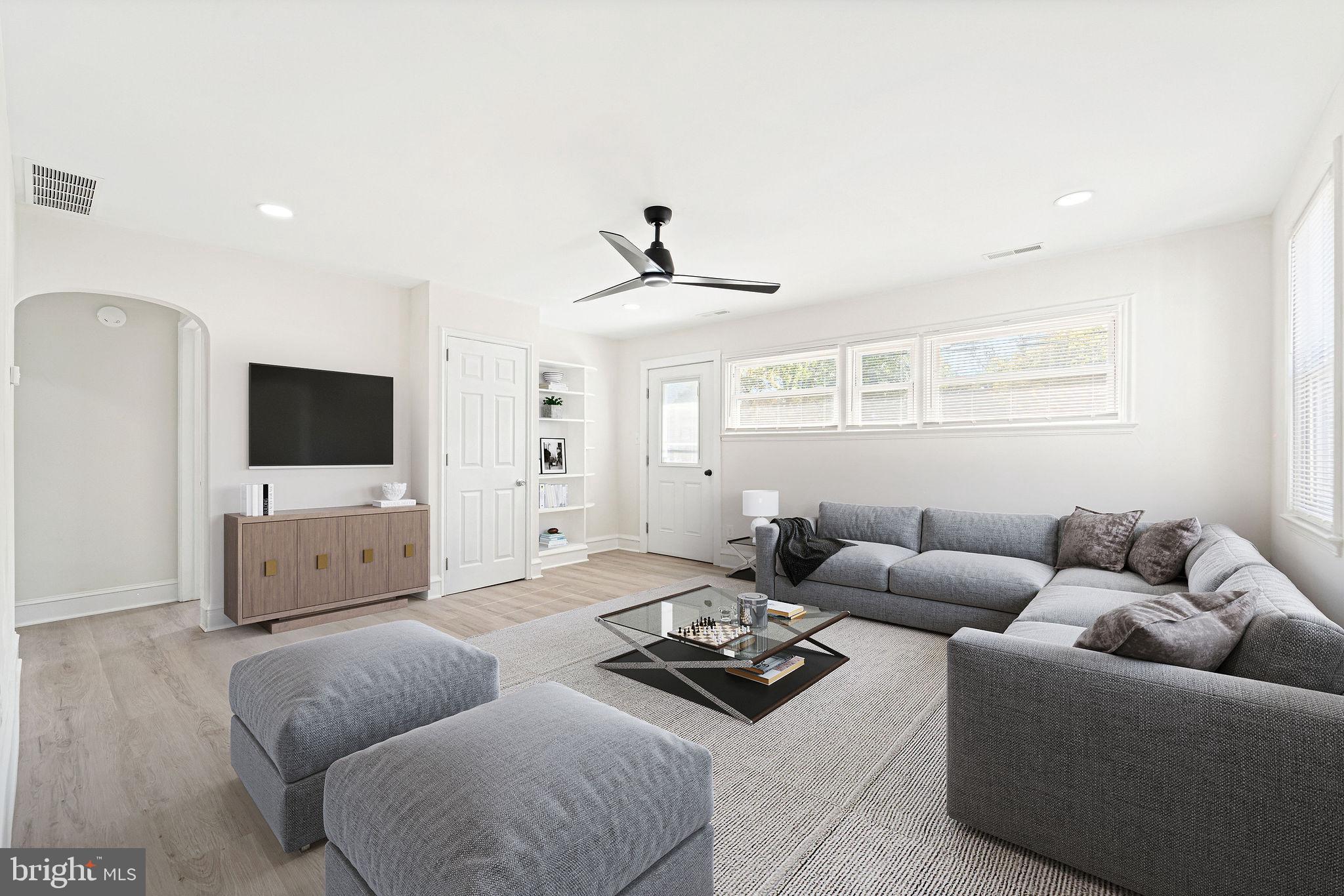115 Chestnut Street Salem, NJ 08079 - Photo 7 of 34 a living room with furniture and a flat screen tv