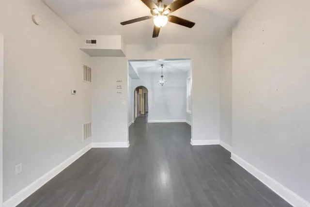 a view of a livingroom with wooden floor