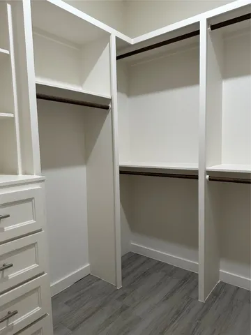 a view of an empty walk in closet