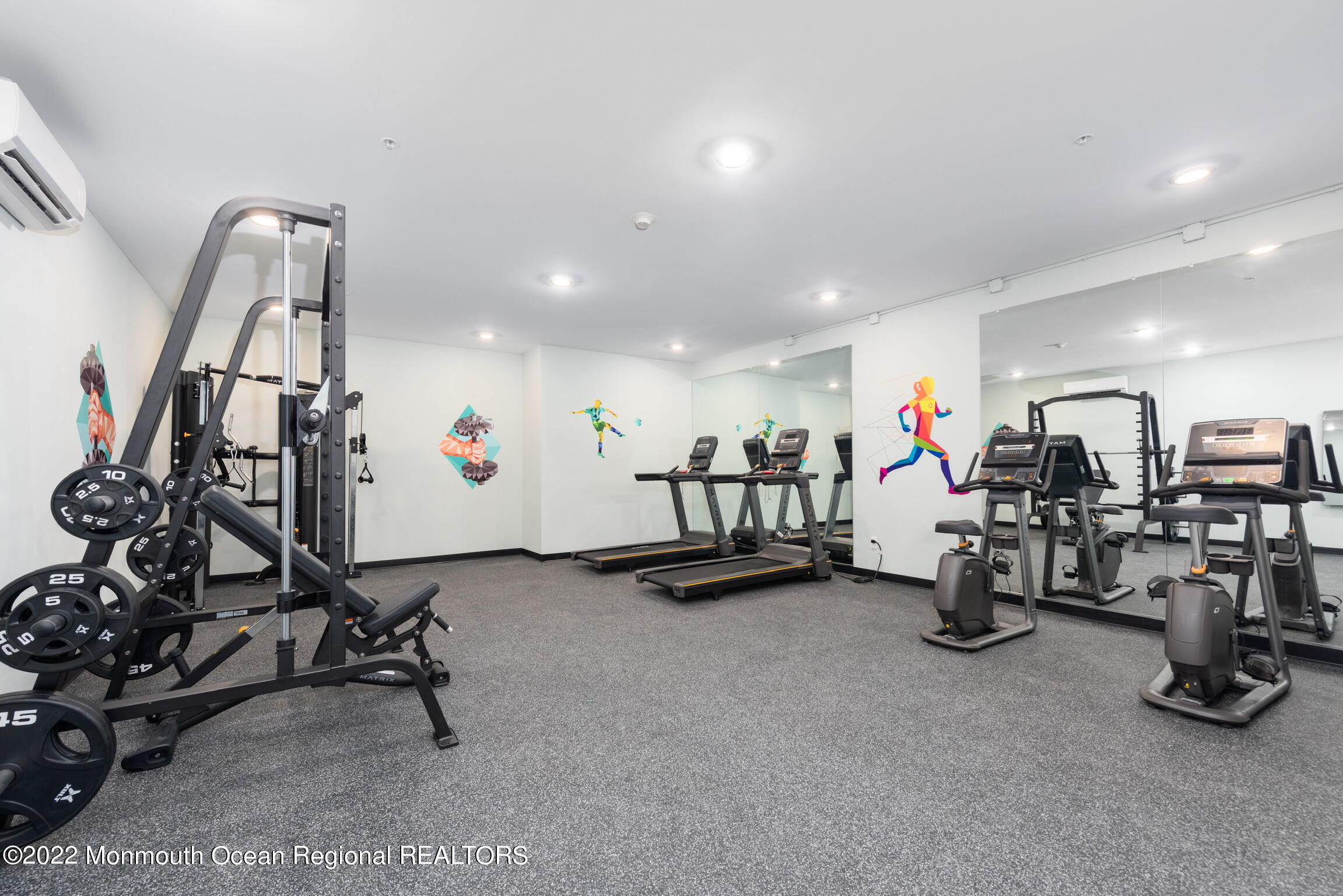 24 Mechanic Street, Unit 407 Red Bank, NJ 07701 - Photo 14 of 17 a view of a room with gym equipment