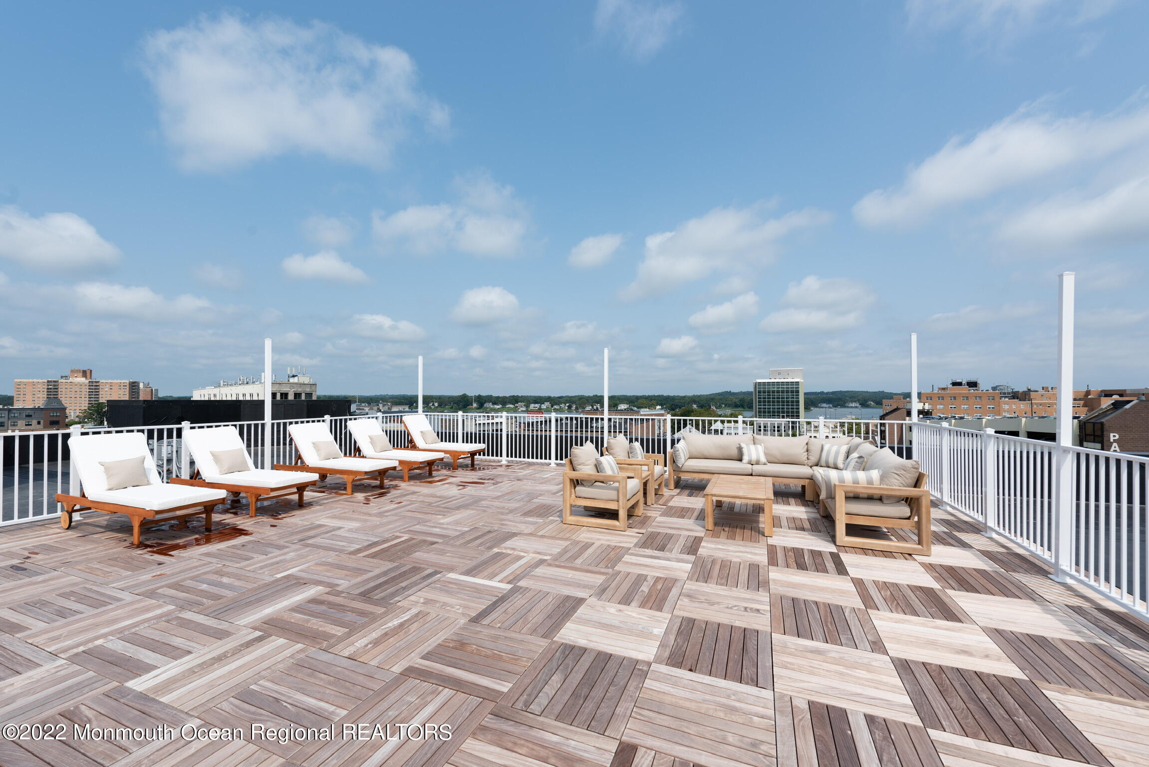 24 Mechanic Street, Unit 407 Red Bank, NJ 07701 - Photo 8 of 17 an outdoor space with patio furniture