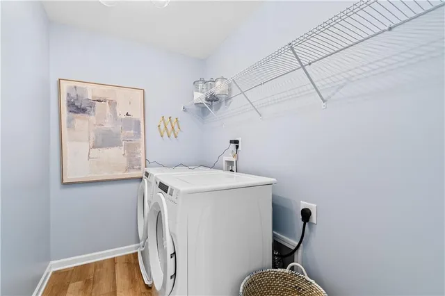 a bed room with furniture and a chandelier