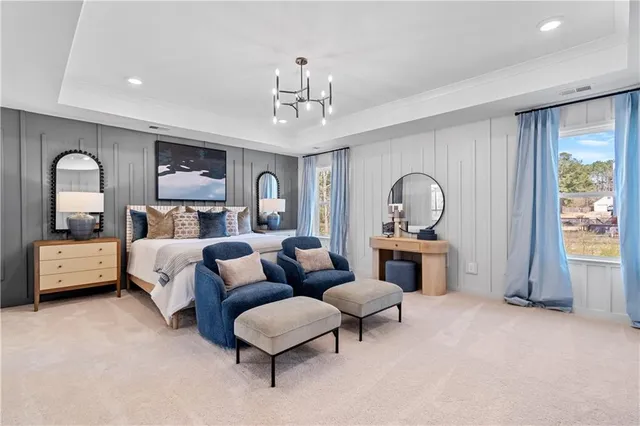 a living room with furniture and a large mirror