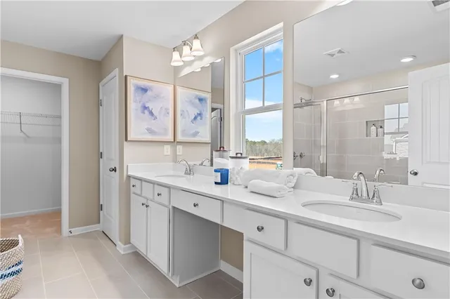 a en suite spacious bathroom with a shower tub and view