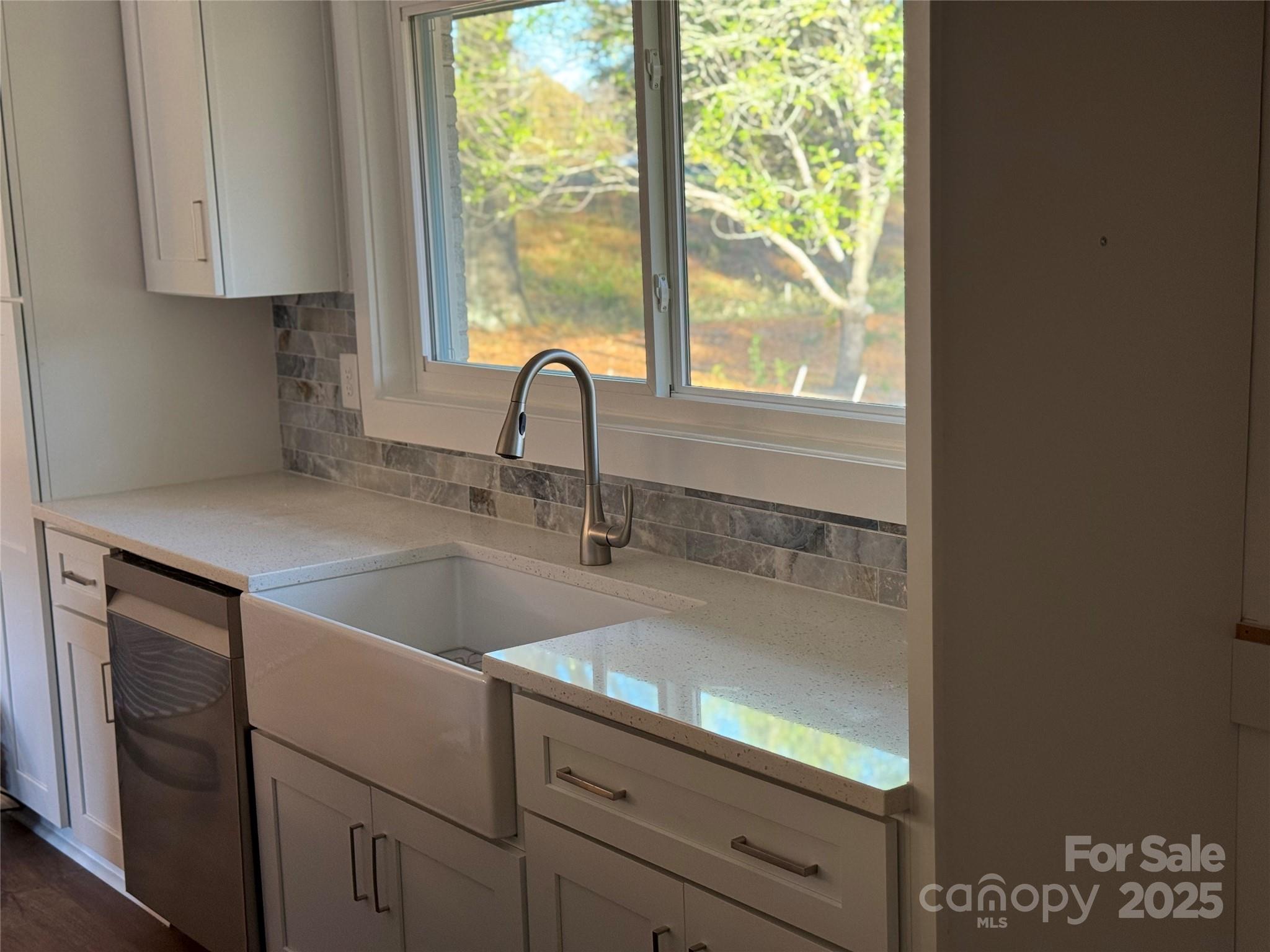 1208 Mariposa Road Stanley, NC 28164 - Photo 9 of 22 a kitchen with a sink and large window