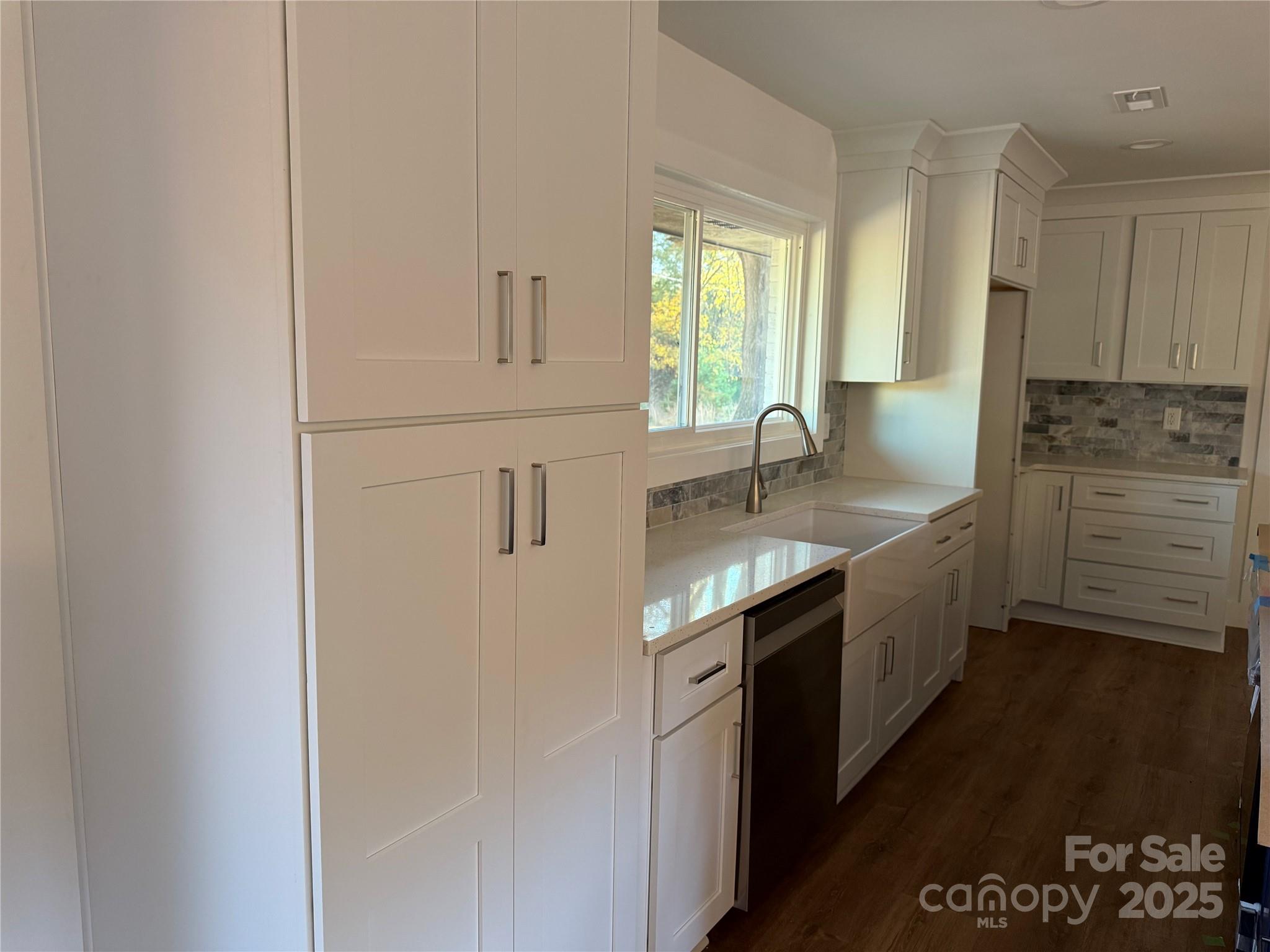 1208 Mariposa Road Stanley, NC 28164 - Photo 10 of 22 a kitchen with granite countertop a sink and cabinets