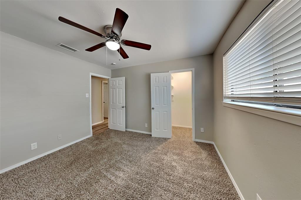 2611 Valley View Drive Corinth, TX 76210 - Photo 12 of 18 a view of empty room with ceiling fan