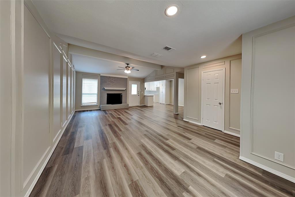 2611 Valley View Drive Corinth, TX 76210 - Photo 2 of 18 a view of a room with wooden floor