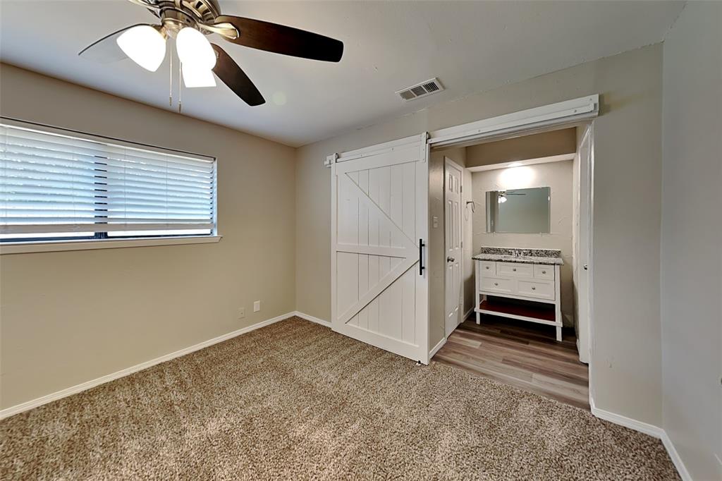 2611 Valley View Drive Corinth, TX 76210 - Photo 8 of 18 a view of an empty room with a window