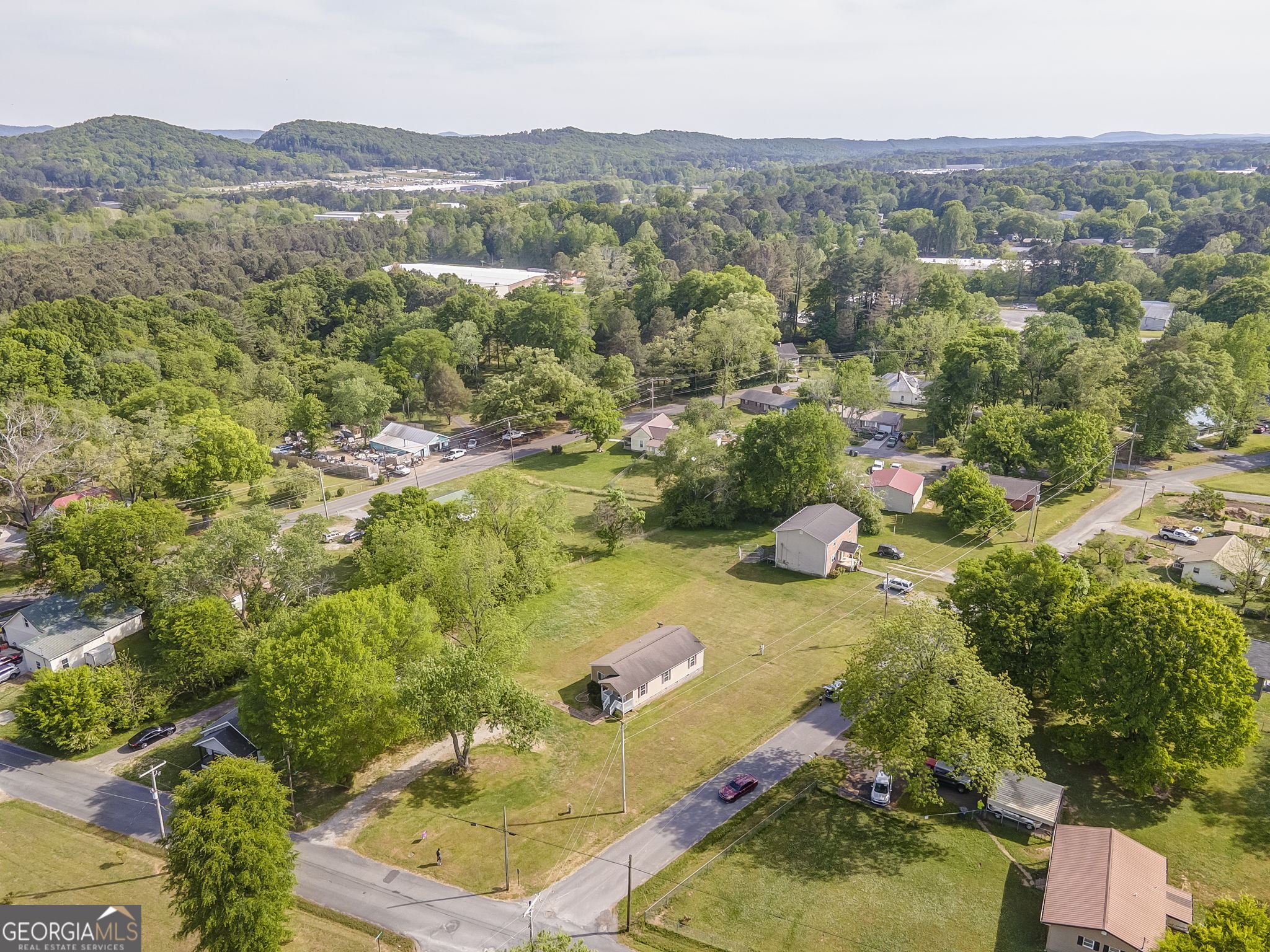 607 Thornton Street LaFayette, GA 30728 - Photo 24 of 25 an aerial view of a house with a yard