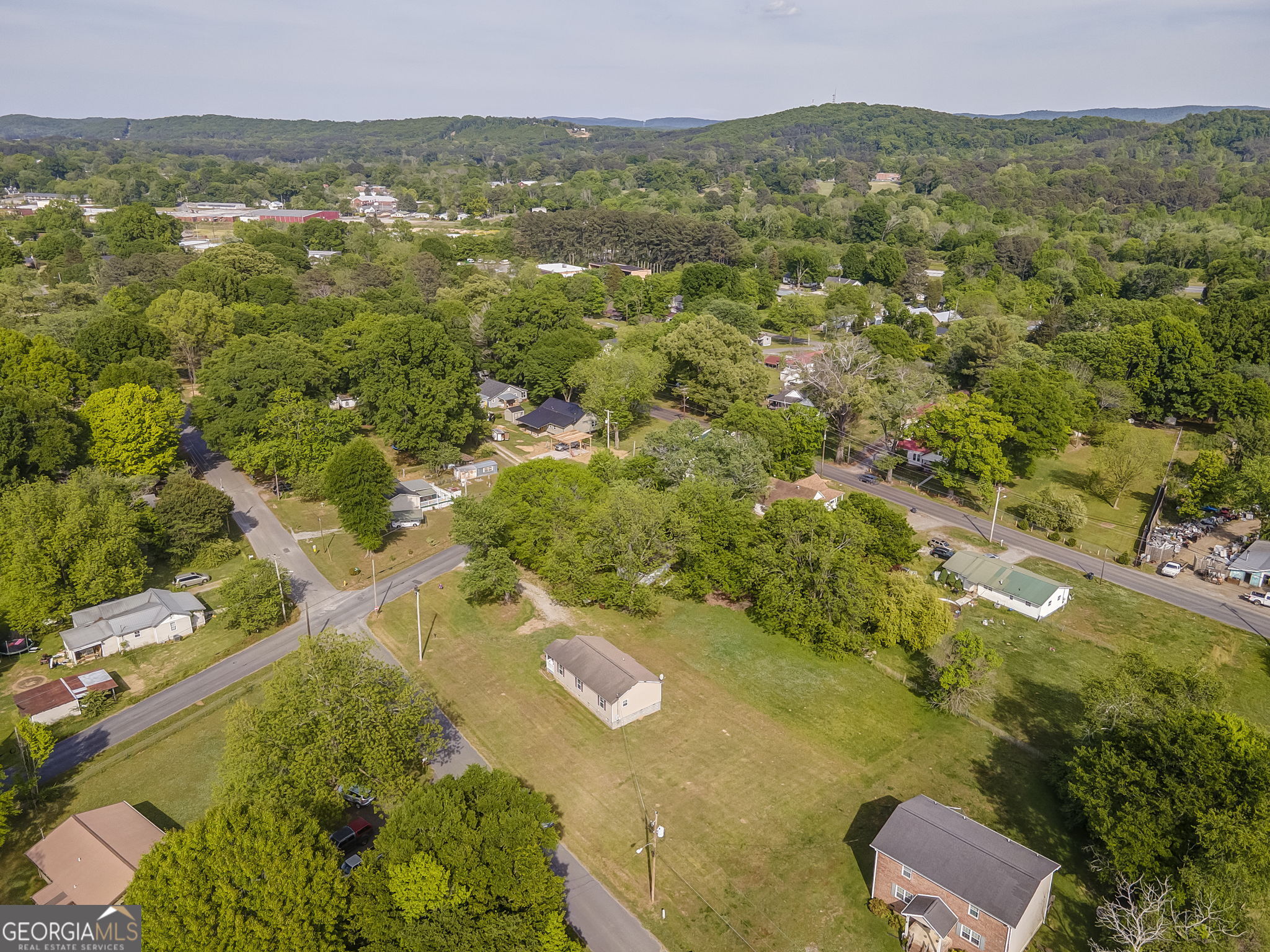 607 Thornton Street LaFayette, GA 30728 - Photo 25 of 25 an aerial view of residential houses with outdoor space
