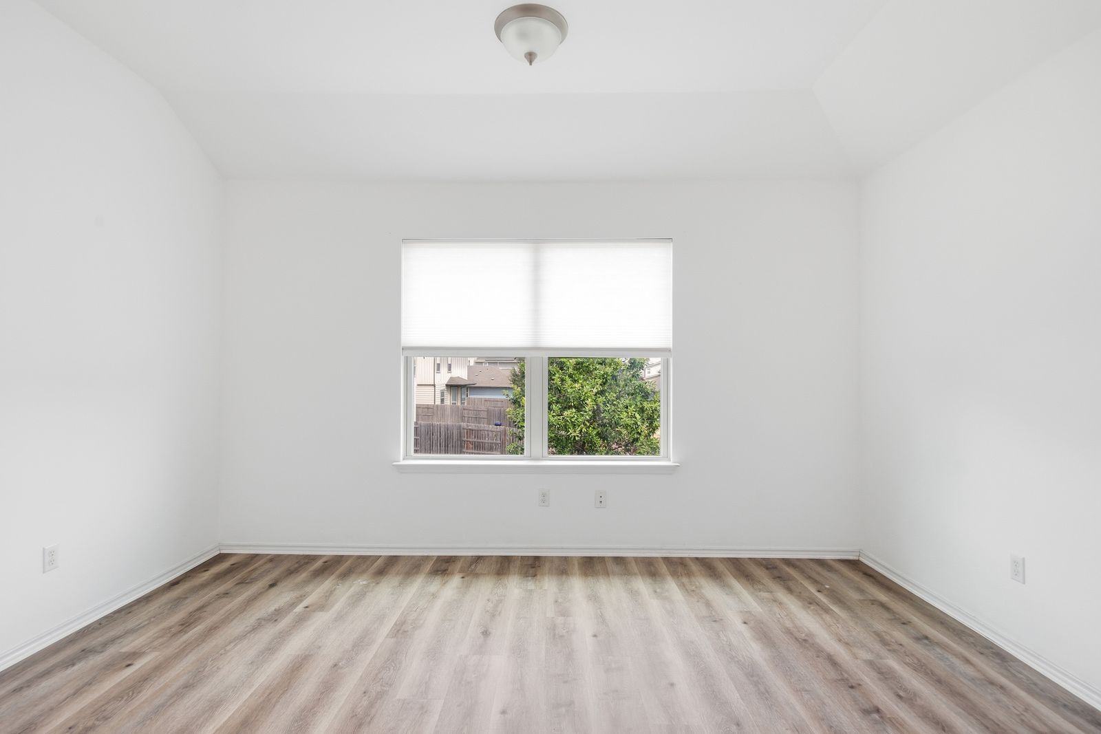 8012 Izetta Lane Austin, TX 78744 - Photo 18 of 27 an empty room with a window