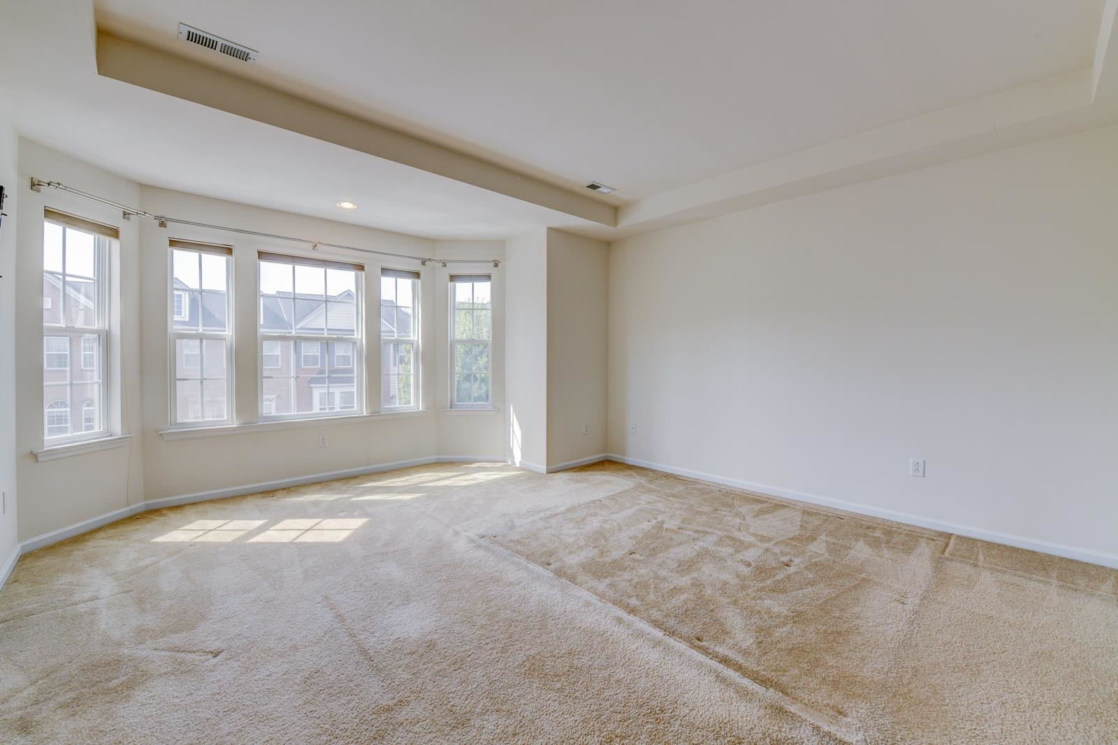 23 Creekside Court, Unit 23 Secaucus, NJ 07094 - Photo 35 of 38 a view of an empty room with a window