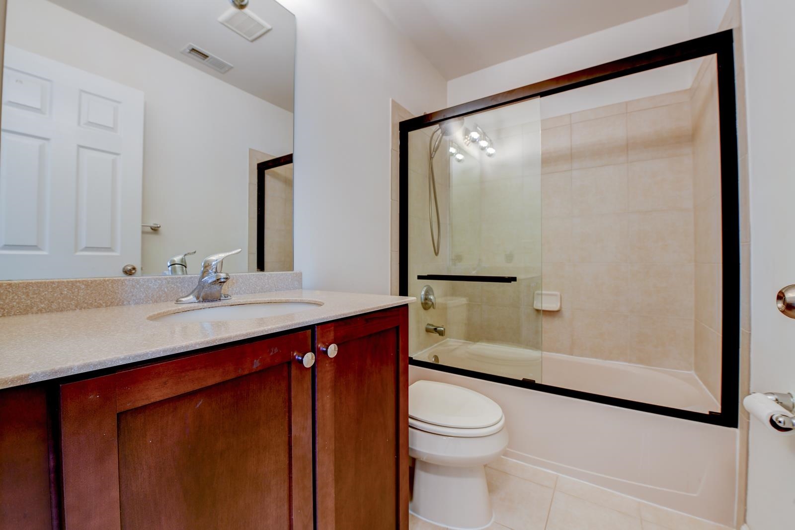 23 Creekside Court, Unit 23 Secaucus, NJ 07094 - Photo 6 of 38 a bathroom with a sink a toilet and shower