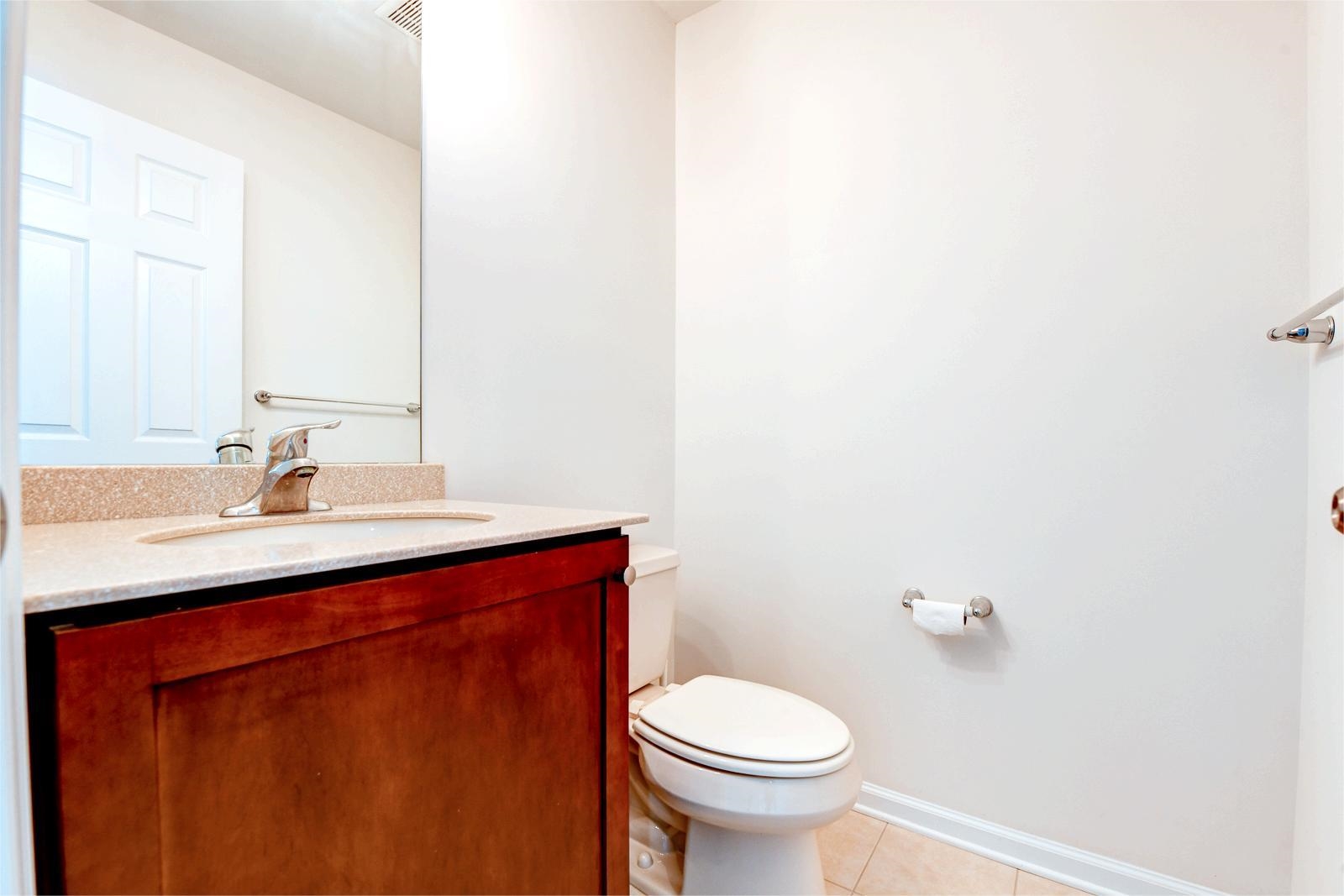 23 Creekside Court, Unit 23 Secaucus, NJ 07094 - Photo 10 of 38 a bathroom with a sink and a toilet