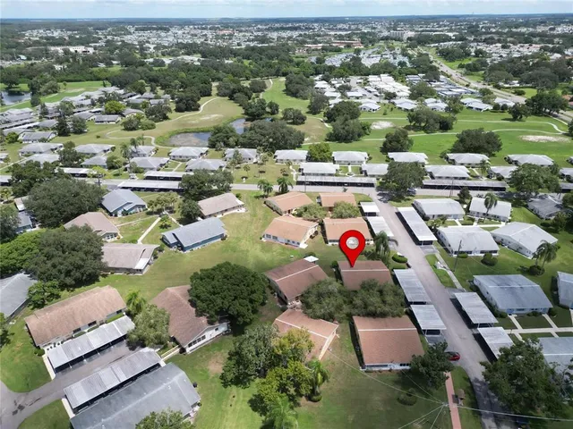 a sign that is on a brick wall