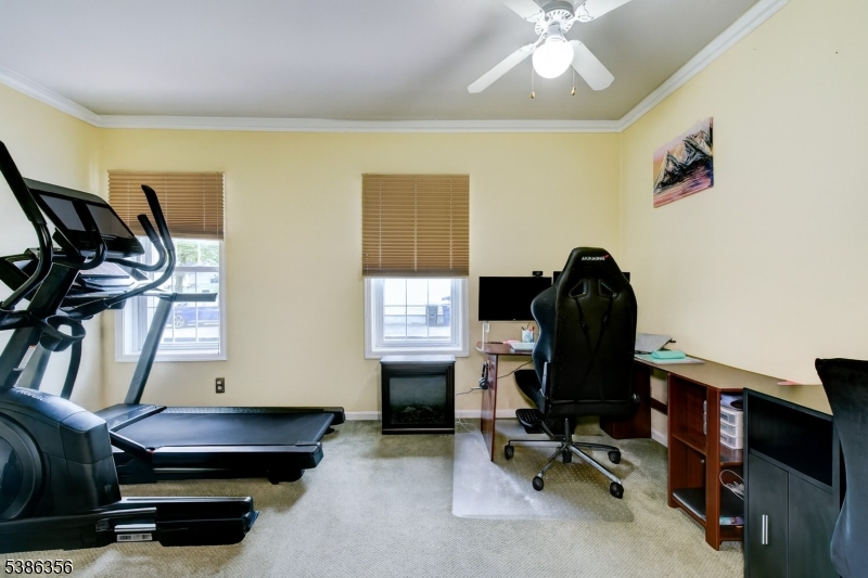 481 Terrill Road Fanwood, NJ 07023 - Photo 16 of 31 a view of a workspace with furniture and a window