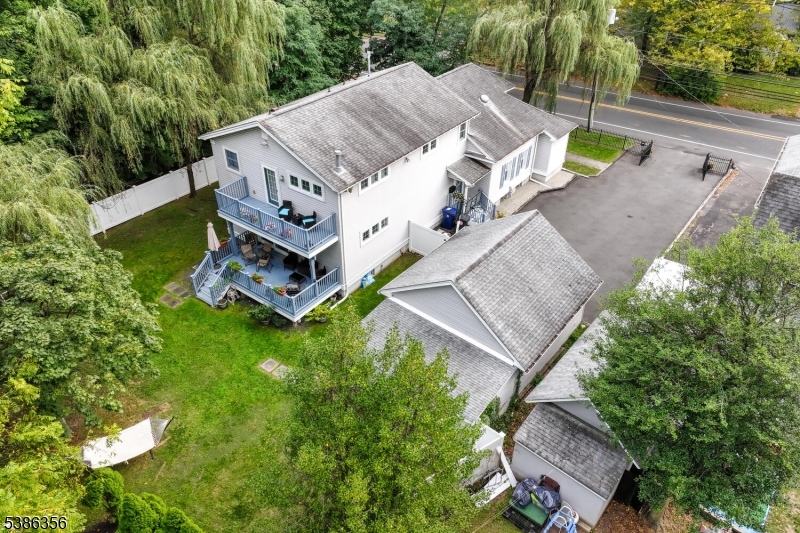 481 Terrill Road Fanwood, NJ 07023 - Photo 30 of 31 an aerial view of a house with a big yard and large trees