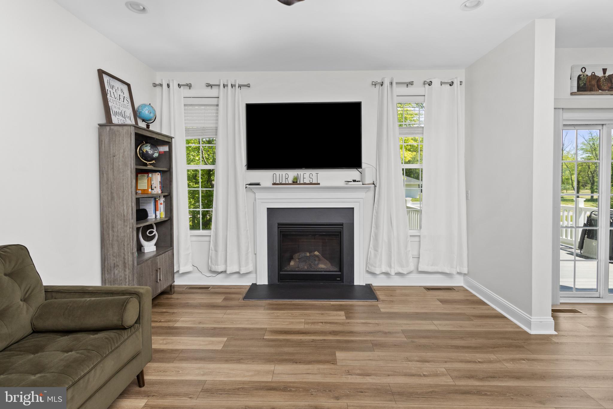 6 Buck Ln Mount Mount Laurel, NJ 08054 - Photo 20 of 49 a living room with fireplace furniture and a flat screen tv