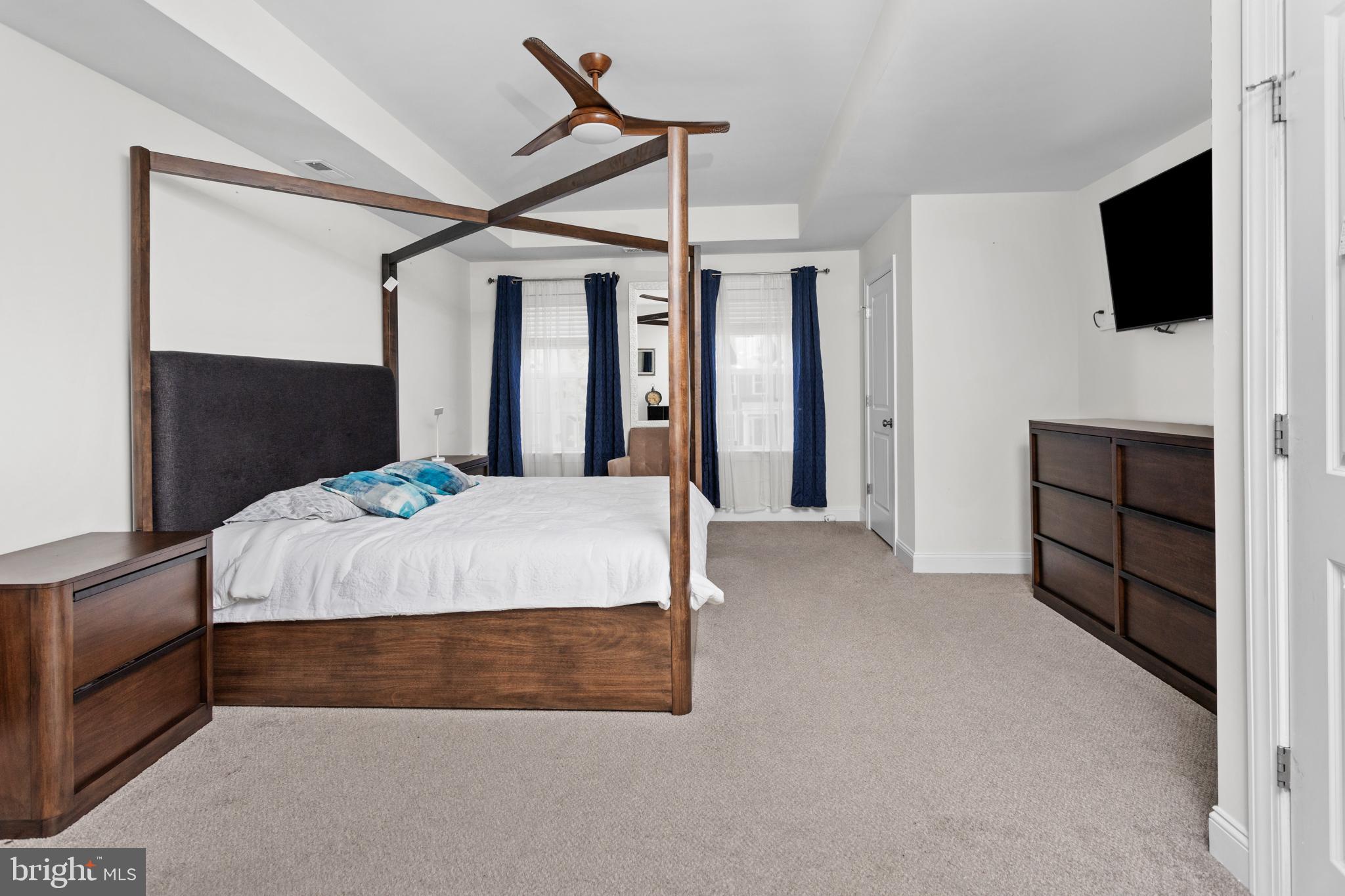 6 Buck Ln Mount Mount Laurel, NJ 08054 - Photo 24 of 49 a bedroom with a bed and a flat screen tv