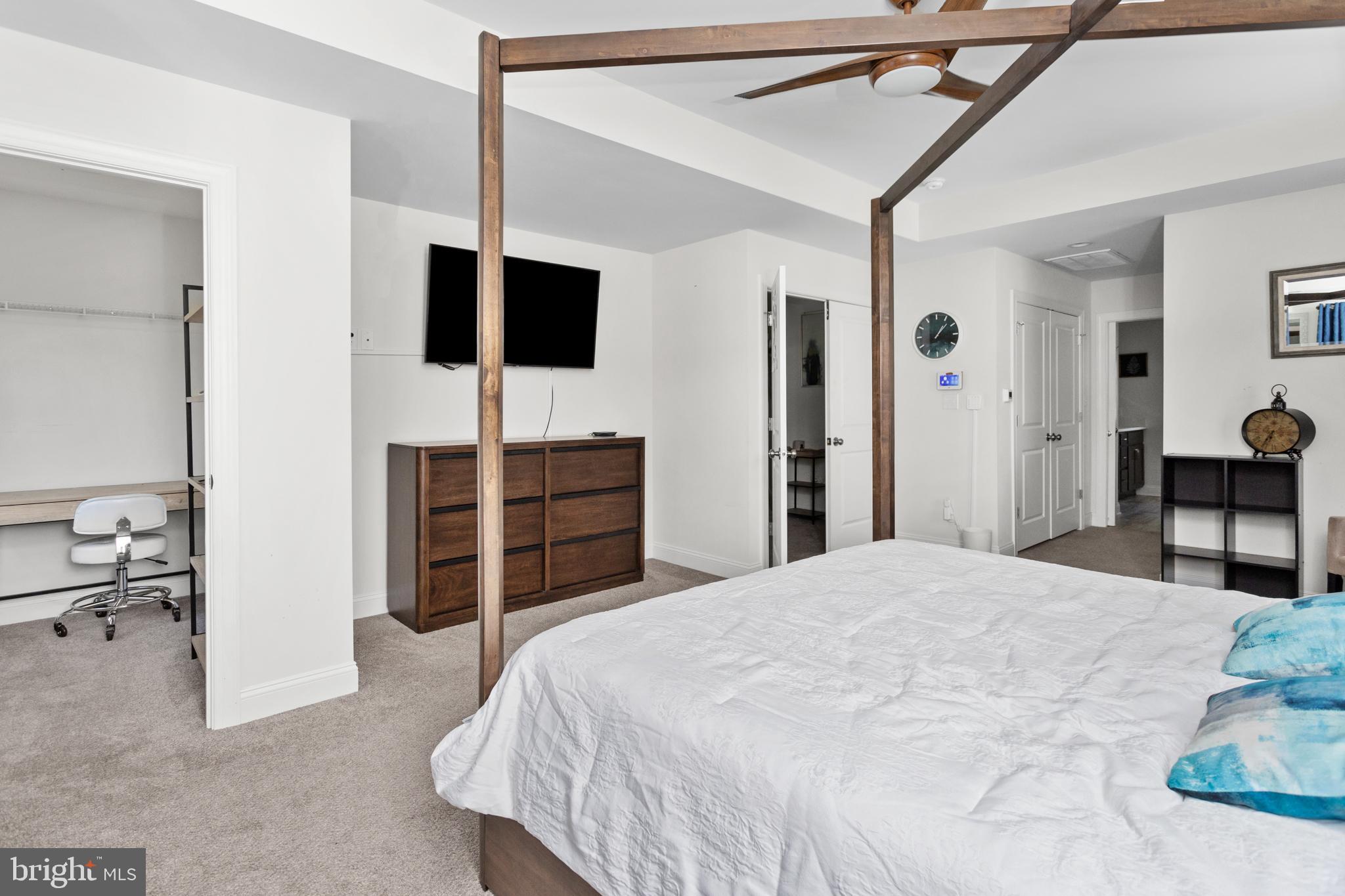 6 Buck Ln Mount Mount Laurel, NJ 08054 - Photo 25 of 49 a spacious bedroom with a bed and a flat screen tv