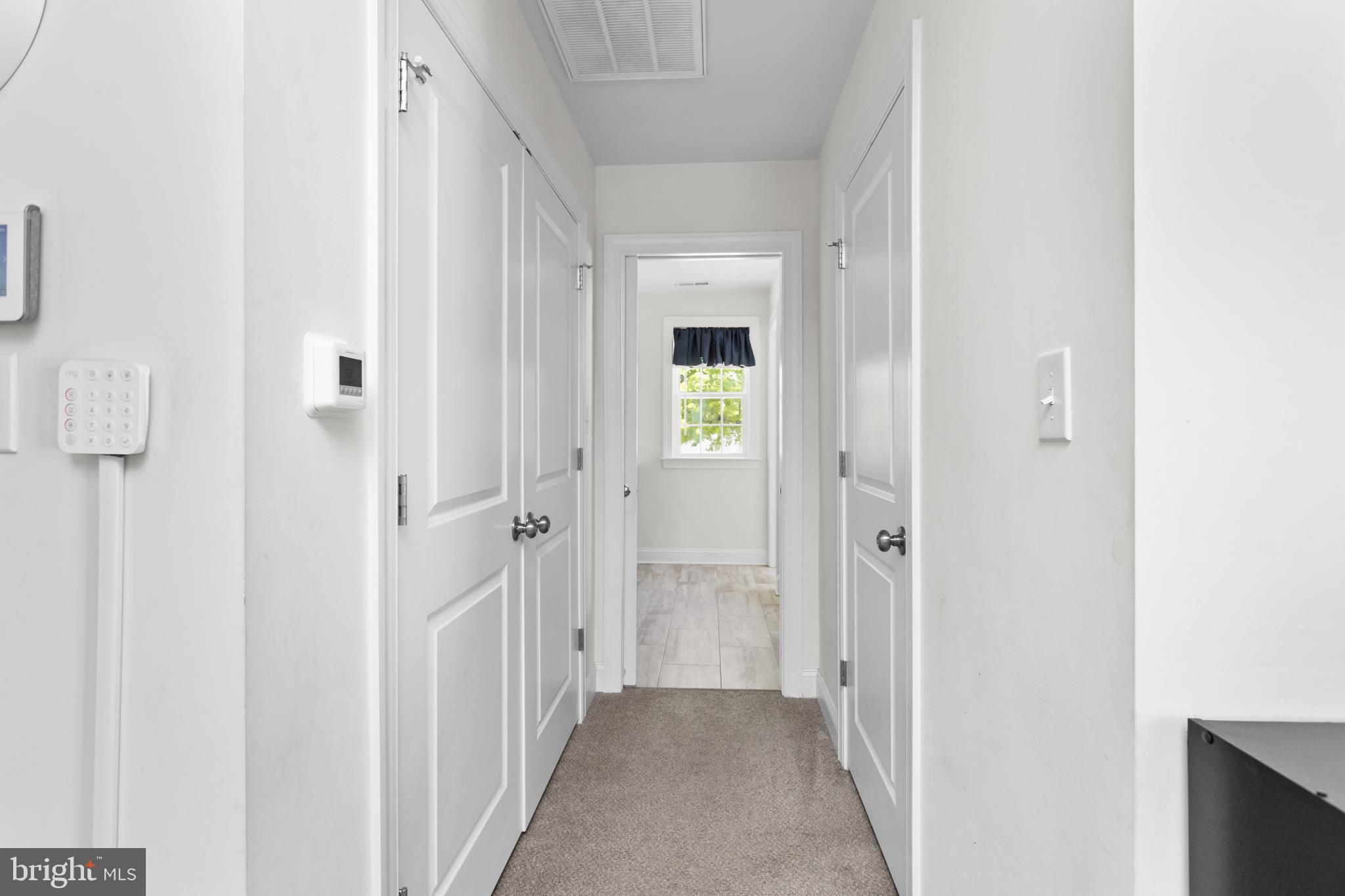 6 Buck Ln Mount Mount Laurel, NJ 08054 - Photo 27 of 49 a view of a hallway with wooden floor