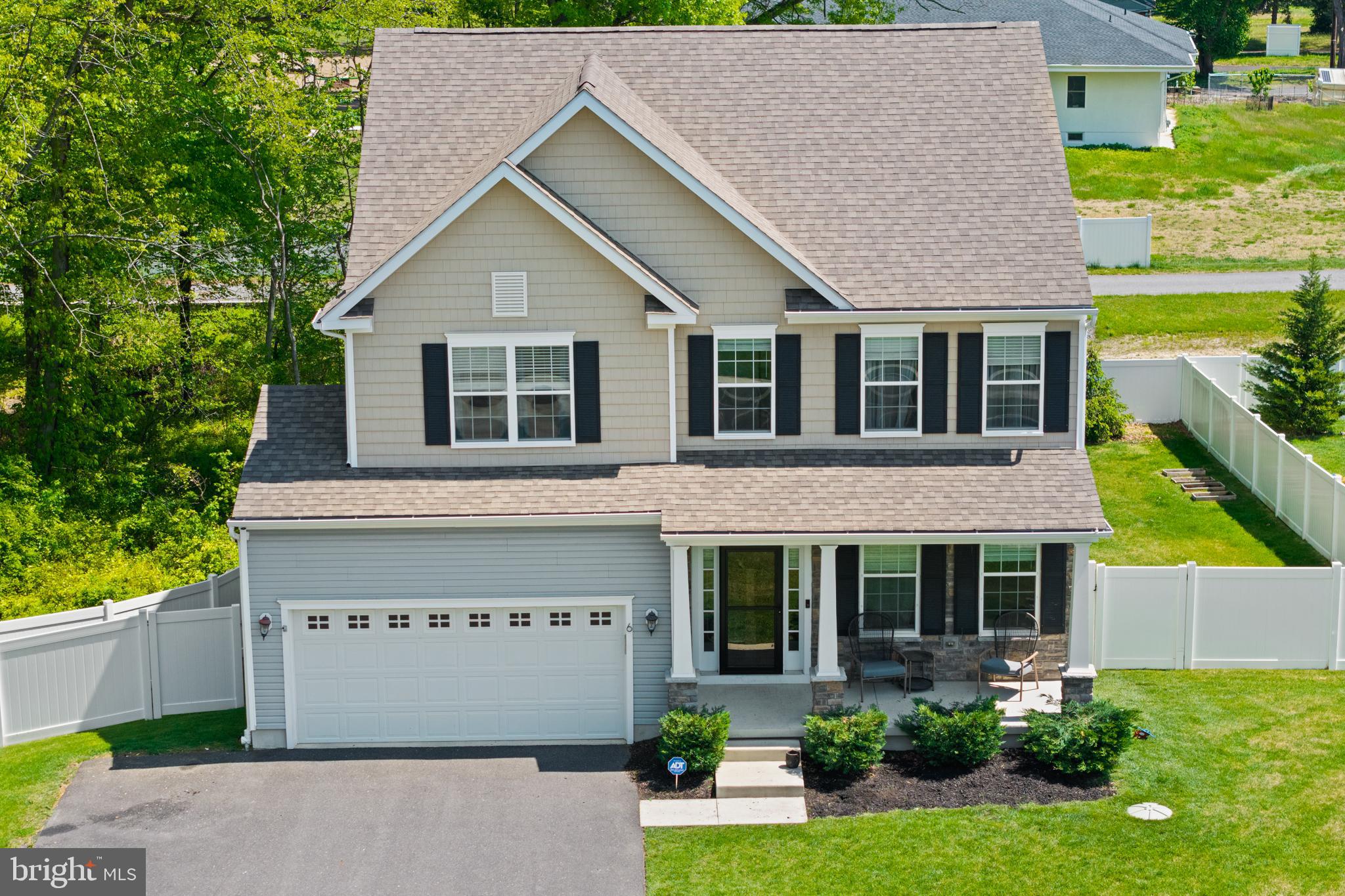 6 Buck Ln Mount Mount Laurel, NJ 08054 - Photo 3 of 49 a front view of a house with a yard and potted plants