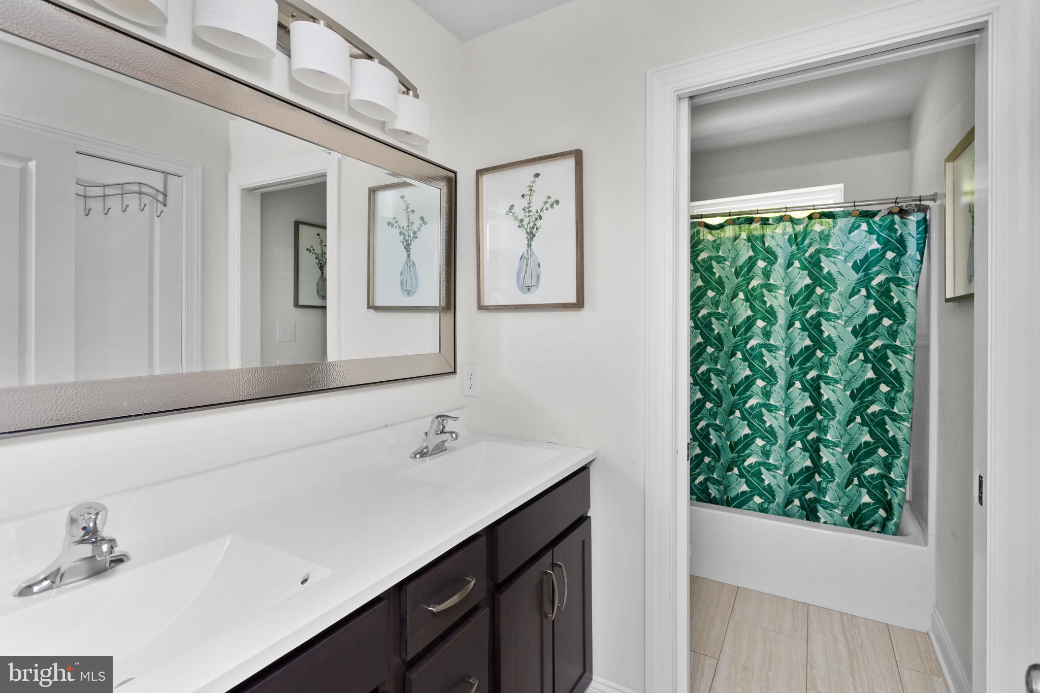 6 Buck Ln Mount Mount Laurel, NJ 08054 - Photo 31 of 49 a bathroom with a sink and a mirror