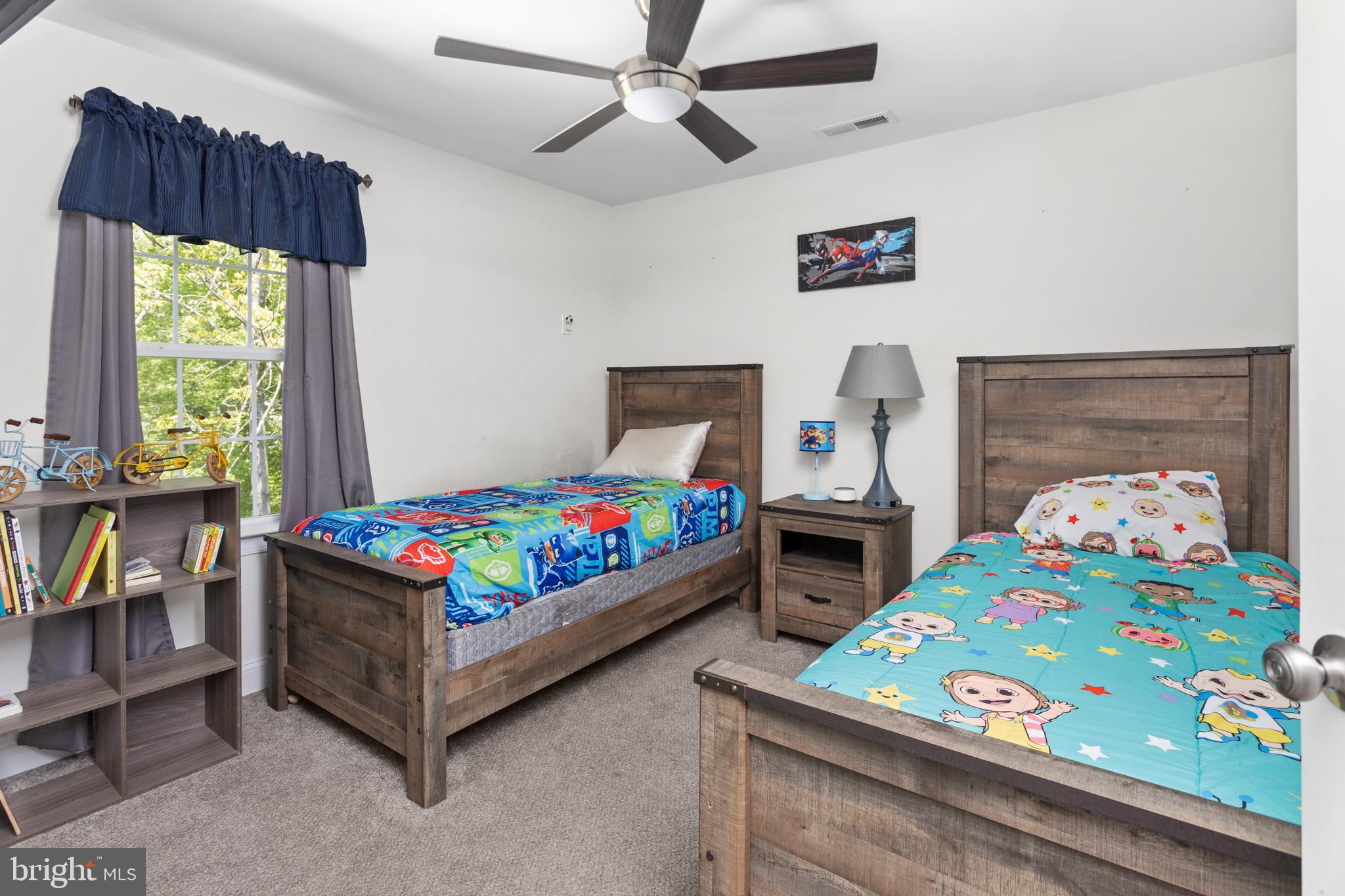 6 Buck Ln Mount Mount Laurel, NJ 08054 - Photo 35 of 49 a bedroom with a bed and a table in it