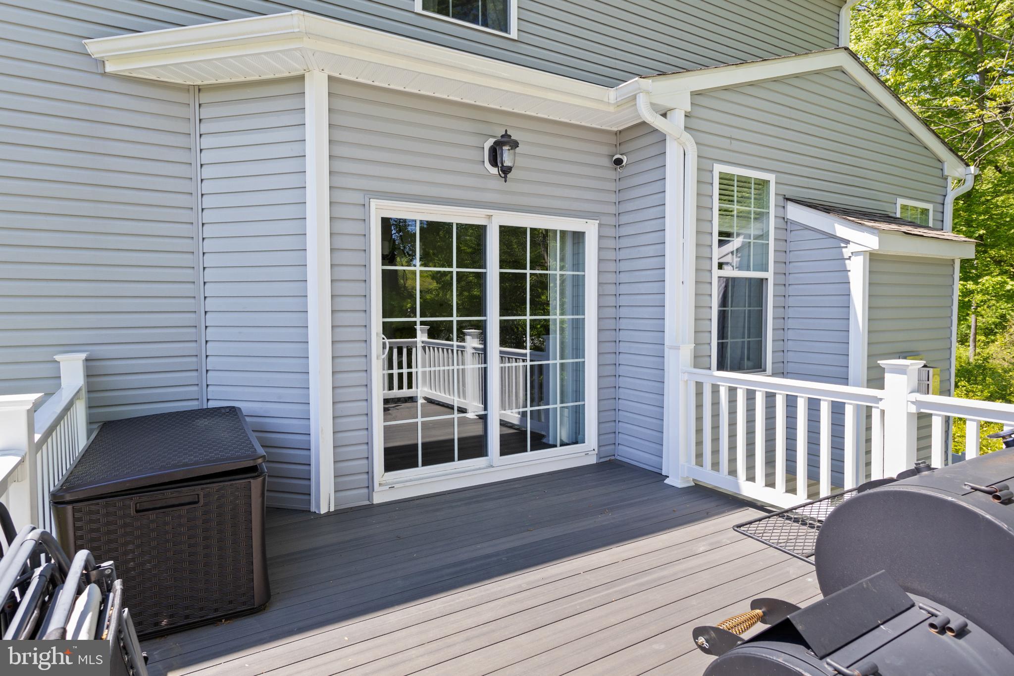 6 Buck Ln Mount Mount Laurel, NJ 08054 - Photo 44 of 49 a view of a deck with wooden floor and a yard