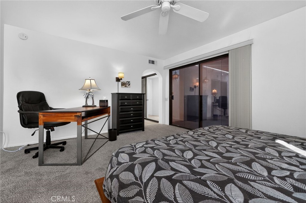 610 Violeta Drive Palm Springs, CA 92262 - Photo 11 of 25 a bedroom with furniture and a window