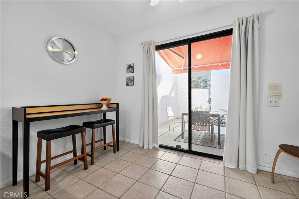 610 Violeta Drive Palm Springs, CA 92262 - Photo 20 of 25 a view of room with window and a table