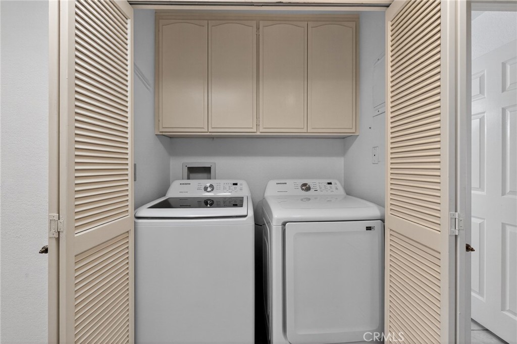 610 Violeta Drive Palm Springs, CA 92262 - Photo 21 of 25 a utility room with dryer and washer